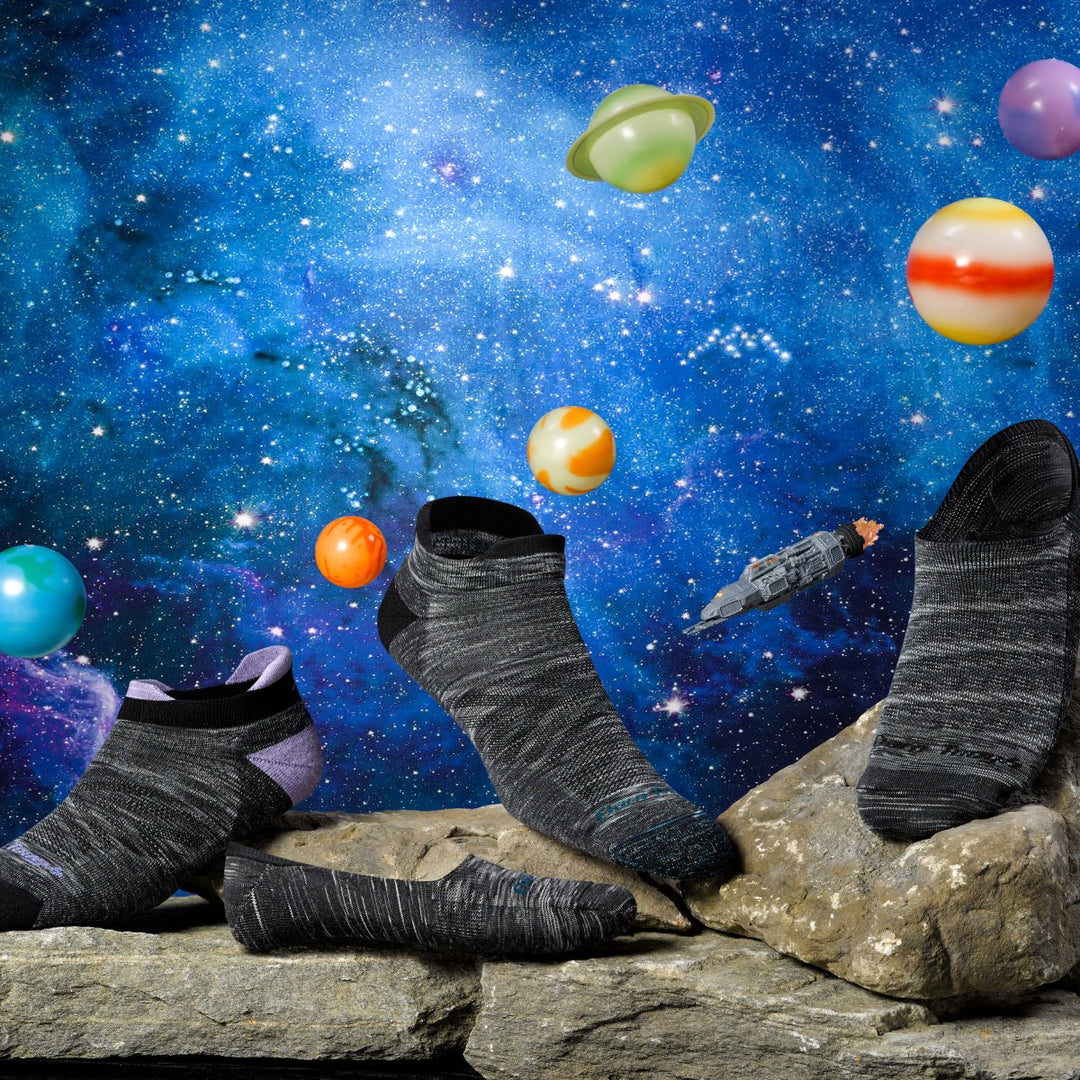 Four Darn Tough socks looking out of this world in gray space dye. Plus some planets